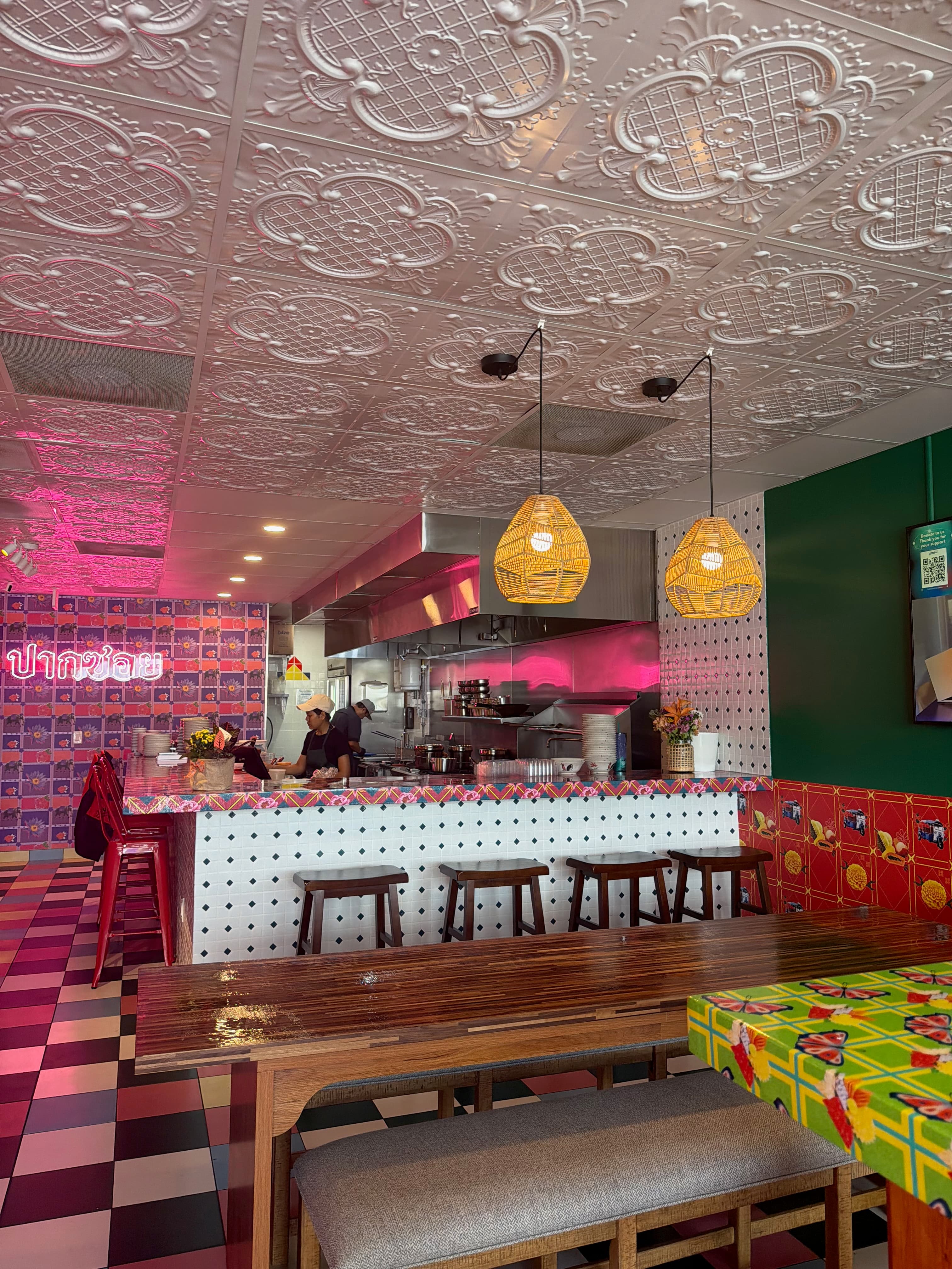 Kitchen counter with wok and stove